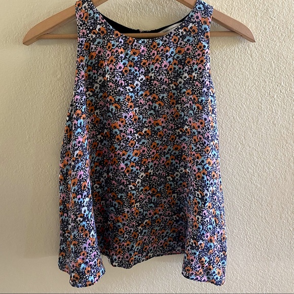 Zara sleeveless flowy blouse with partially open back and floral pattern - Picture 1 of 5